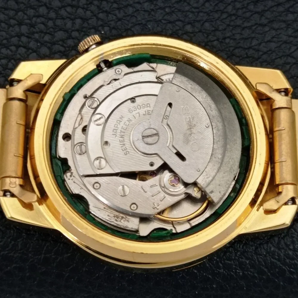 Vintage 1980 Seiko Automatic Mens Gold Watch W/daydate & Arabic accents